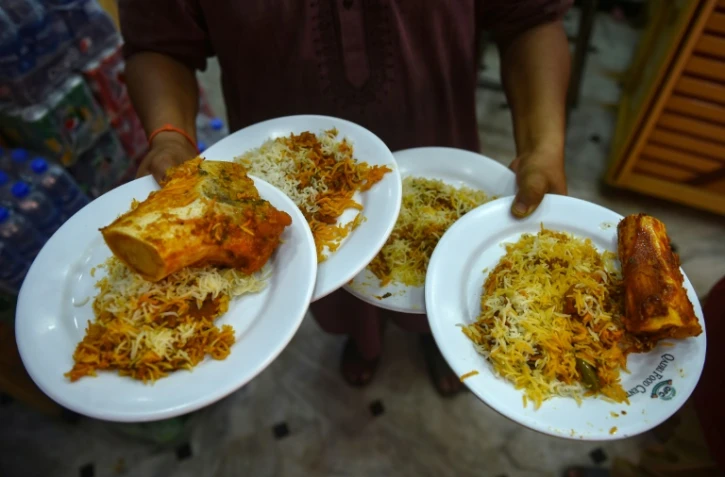 Des assiettes de biryani dans un restaurant de Karachi, le 19 septembre 2023 au Pakistan