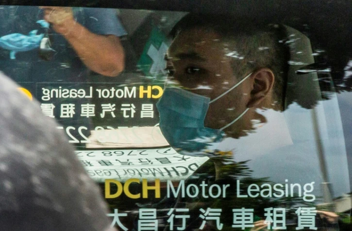 Tong Ying-kit, poursuivi pour avoir enfreint la loi sur la sécurité nationale, arrive le 6 juillet 2020 au tribunal de Kowloon, à Hong Kong 