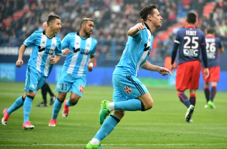 Florian Thauvin fête l'un de ses 3 buts inscrits pour l'OM à Caen, le 30 avril 2017 