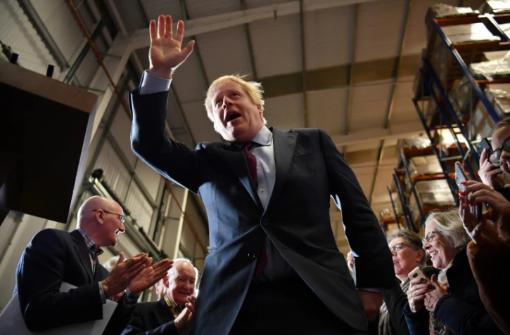 Le Premier ministre conservateur Boris Johnson arrivant à un meeting pour les législatives du 12 décembre au Royaume-Uni, près de Gloucester (ouest de l'Angleterre) le 9 décembre 2019.
