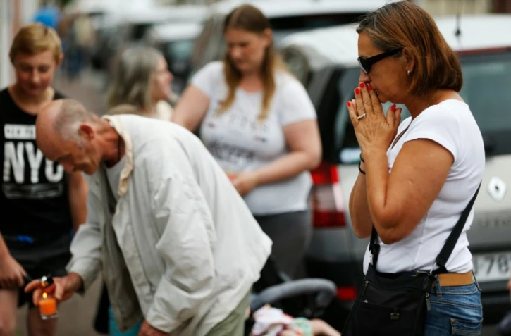Recueillement le 27 juillet 2016 à Saint-Etienne-du-Rouvray, au lendemain de l'assassinat du père Jacques Hamel, égorgé dans son église