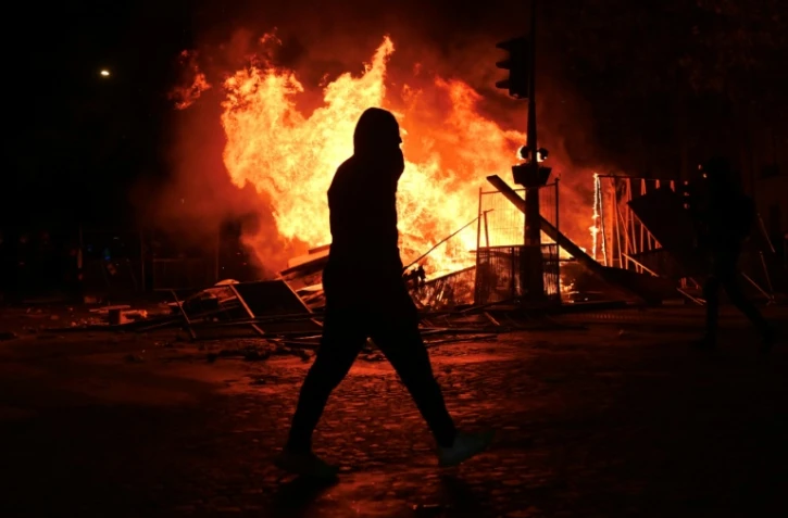 Incendie boulevard Haussmann à Paris lors des violences après la manifestation contre la "vie chère", le 17 octobre 2026