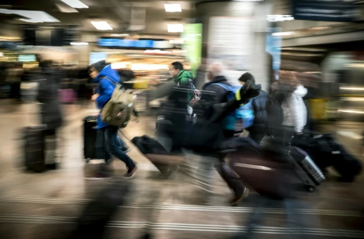 Des voyageurs le 8 février 2016 à la gare de Lyon-Part-Dieu à Lyon