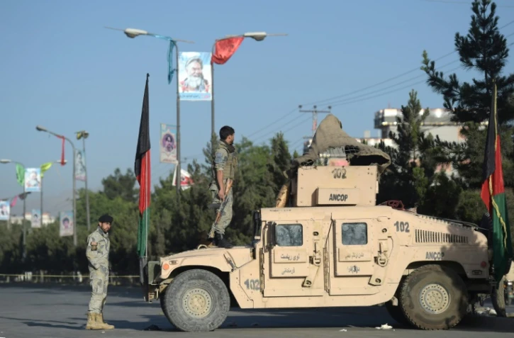 Des forces de sécurité afghanes à Kaboul après un attentat suicide contre des chiites, le 16 juin 2017