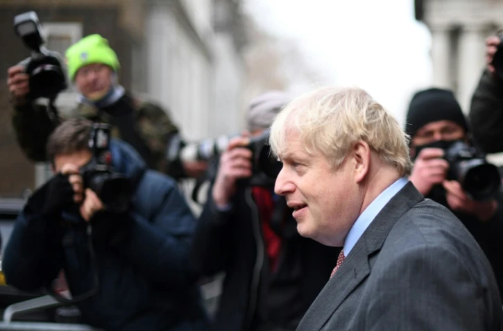 Le Premier ministre britannique Boris Johnson arrive au 10 Downing Street à Londres le 8 décembre 2020