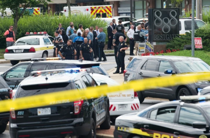 Des policiers devant les locaux du Capital Gazette à Annapolis, dans le Maryland, le 28 juin 2018