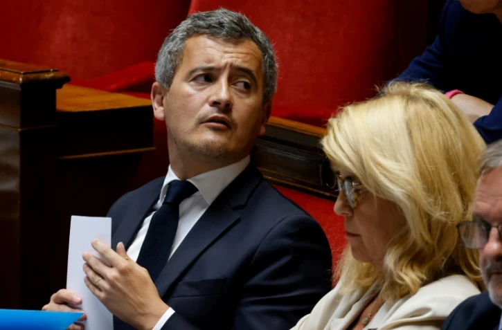 Le ministre français de l'Intérieur Gérald Darmanin (g) à l'Assemblée nationale à Paris, le 20 juin 2023