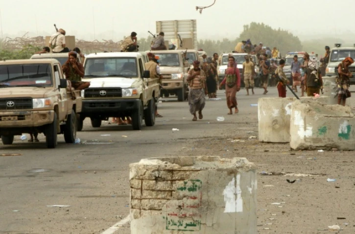 Les forces progouvernementales au Yémen arrivent dans le secteur d'Al-Durayhimi, à quelque neuf km au sud de l'aéroport de Hodeida, le 13 juin 2018 