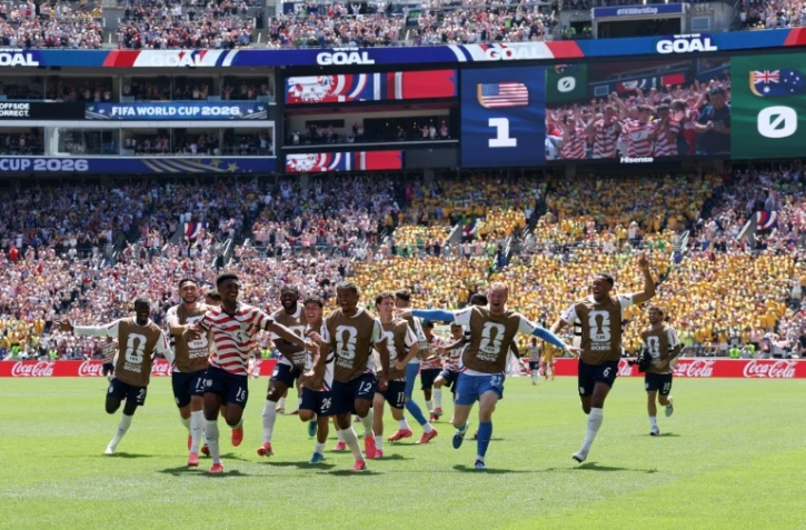Les joueurs de Team USA exultent après leur deuxième but contre l'Australie, au Mondial-2026, le 19 juin 2026 à Seattle