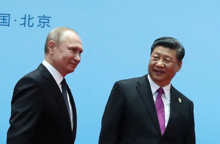 Le président chinois Xi Jinping et le président russe Vladimir Poutine à Pékin, le 27 avril 2019