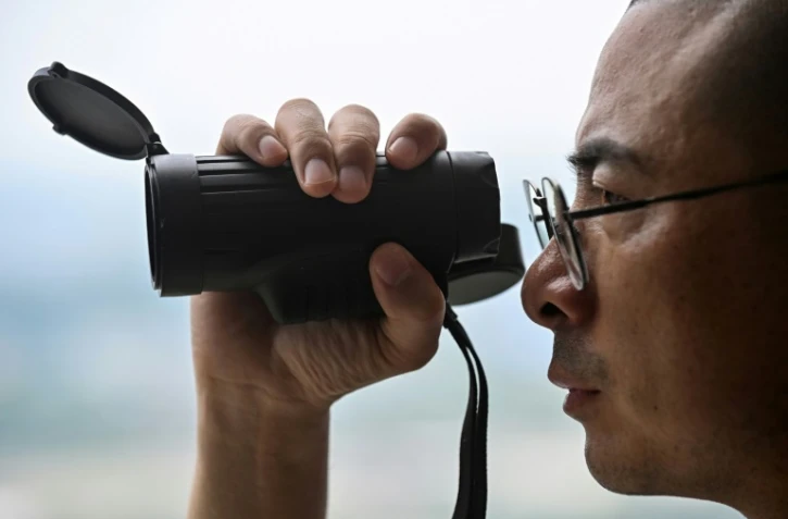 Un détective privé enquête sur une éventuelle infidélité au sein d'un couple, le 12 juin 2020à Shanghai