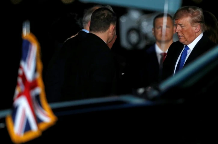 Le président américain Donald Trump (d) à son arrivée à Londres pour participer au sommet de l'Otan, le 2 décembre 2019