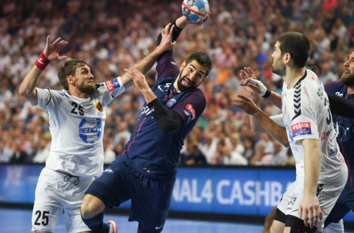 Le joueur du PSG Nikola Karabatic (c) lors de la victoire pour la 3e place de la Ligue des champions face au Vardar Skopje à Cologne