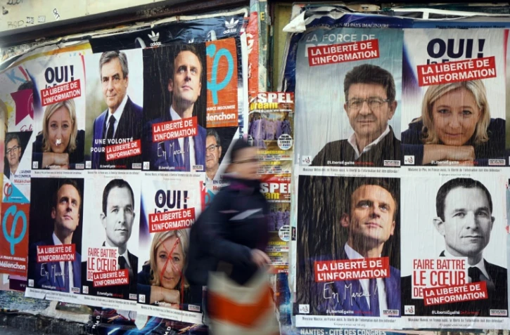 Affiches électorales des candidats à l'élection présidentielle le 9 avril 2017 à Paris