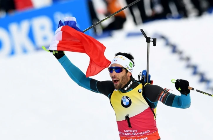 Le Français Martin Fourcade à l'arrivée de la mass start, 15 km, qu'il a remporté au Grand Bornand, Haute Savoie, le 17 décembre 2017