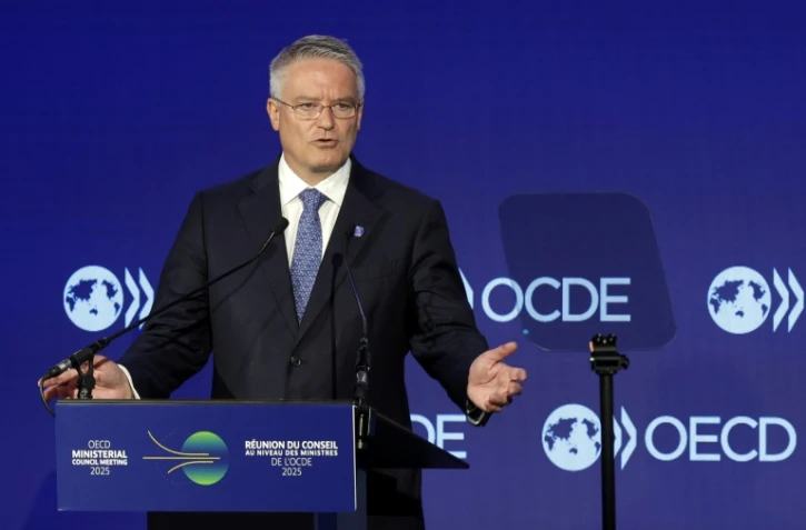 Le secrétaire général de l'OCDE Mathias Cormann s'exprime le 3 juin 2025 au siège de l'OCDE à Paris