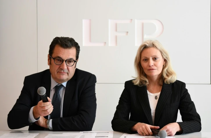 La présidente de la Ligue de football professionnel Nathalie Boy de la Tour et le directeur général de la LFP Didier Quillot, le 11 mars 2020 à Paris