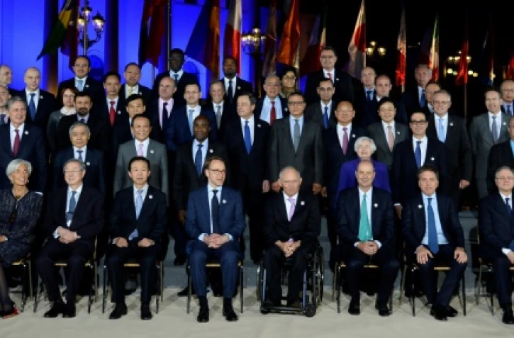 Les ministres des finances et banquiers centraux des pays du G20 posent pour une photo de groupe à Baden-Baden le 17 mars 2017