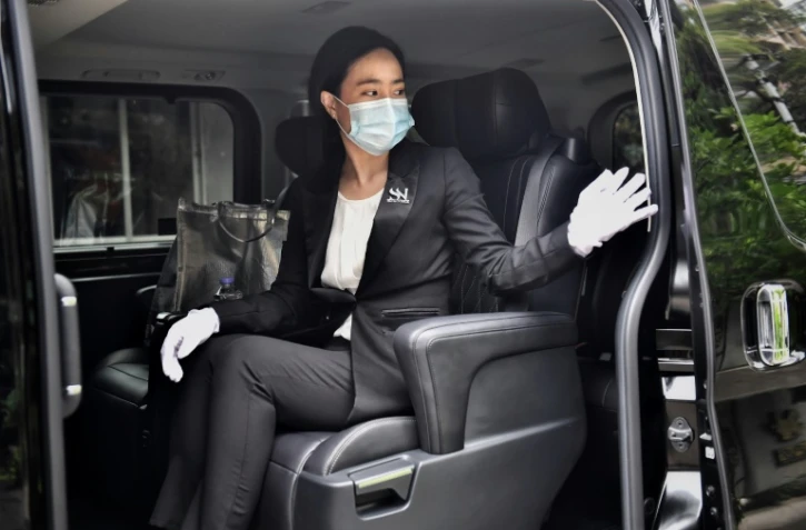 Plats gastronomiques livrés par un majordome, bijou Cartier véhiculé directement depuis l'entrepôt, tours en berline avant le couvre-feu: les super-riches thaïlandais n'ont pas renoncé à leur train de vie malgré la pandémie de coronavirus