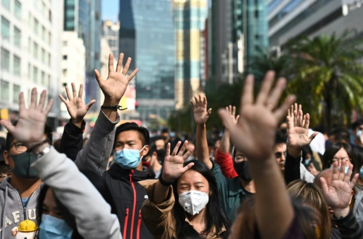Des manifestants prodémocratie participent à une flashmob à Hong Kong à l'heure du déjeuner, le 29 novembre 2019