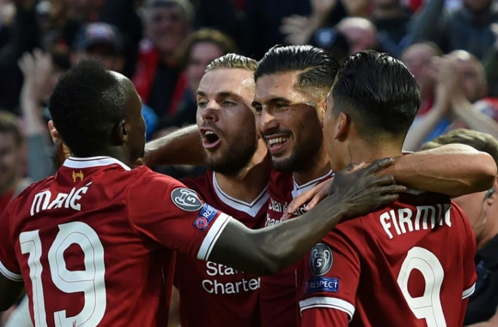 Les joueurs de Liverpool se congratulent après un but d'Emre Can face à Hoffenheim en barrage retour de la Ligue des champions, le 23 août 2017 à Anfield