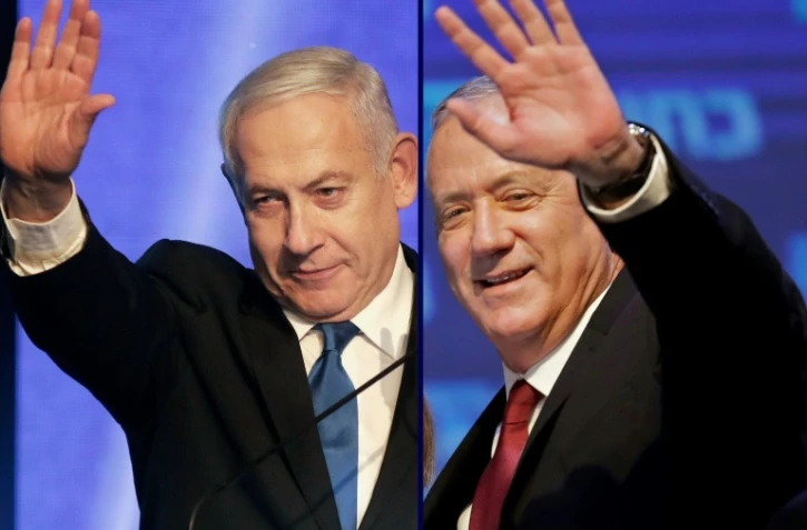 Photo-montage créé le 18 septembre 2019 montrant le Premier ministre israélien Benjamin Netanyahu (à gauche) et son ex-rival Benny Gantz (à droite), à la tête du parti Bleu-Blanc