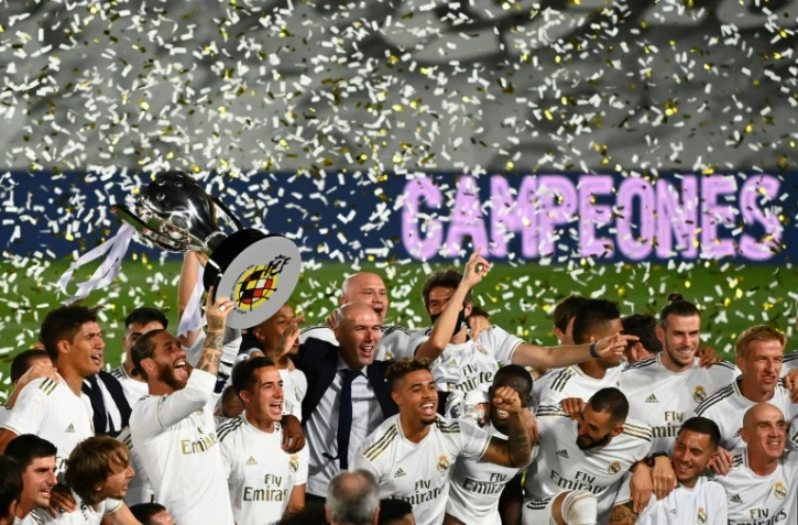 Les joueurs du Real Madrid fêtent leur titre de champions d'Espagne conquis le 16 juillet 2020 au stade Alfredo di Stéfano