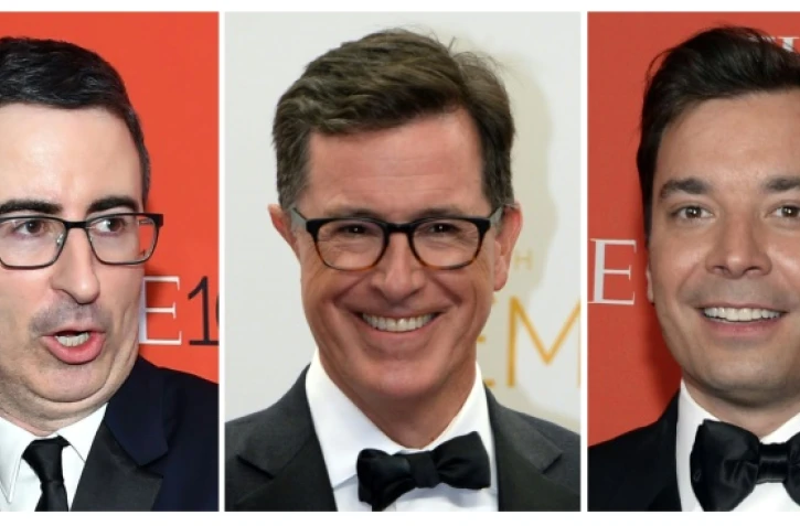 Montage photo montrant John Oliver et Jimmy Fallon (d) à New York le 21 avril 2015, et Stephen Colbert (c) le 25 août 2014 à Los Angeles