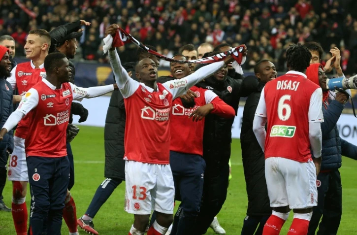 Les joueurs du Stade de Reims fêtent leur victoire sur RC Strasbourg à l'issue des tirs au but au stade Auguste-Delaune, le 7 janvier 2020