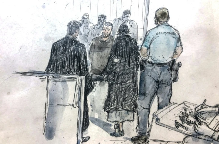 Salah Abdeslam (c) lors de la lecture du verdict du jury de la cour d'assises spéciale de Paris au dernier jour du procÚs des attentats du 13-Novembre, le 29 juin 2022