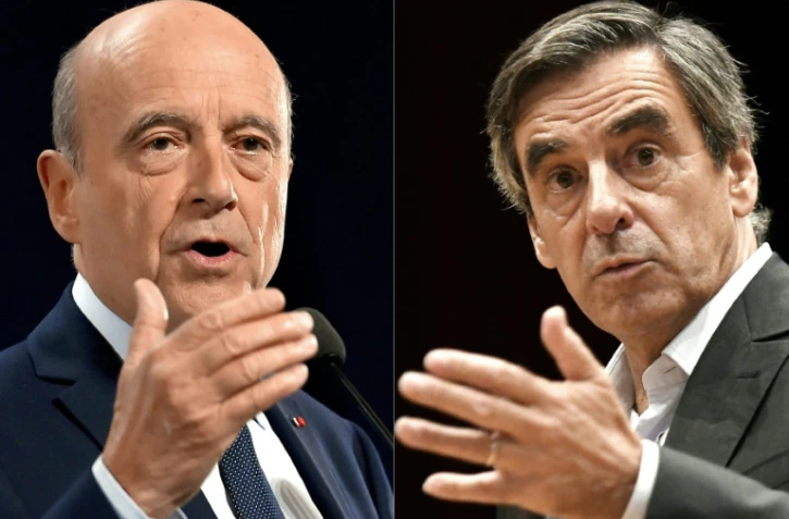 Un photomontage fait le 21 novembre 2016 2016 de photos d'Alain Juppé (g) et François Fillon, candidats à la primaire de la droite