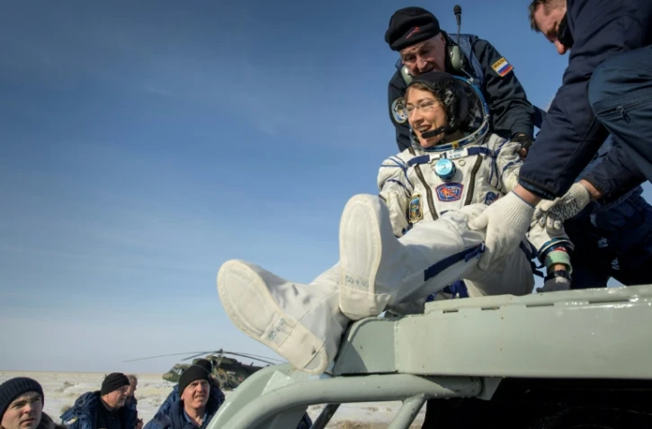 Photo diffusée par la Nasa de l'astronaute américaine Christina Koch extraite de la capsule Soyouz MS-13 peu après son atterrissage au Kazakhstan, le 6 février 2020