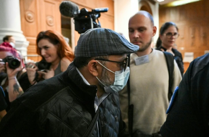 L'accusé Husamettin Dogan à son arrivée à la cour d'appel de Nîmes, dans le Gard, le 8 octobre 2025