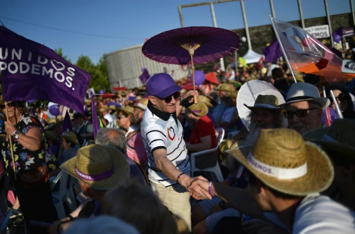 Des militants de Podemos lors d'un meeting de campagne électorale, le 24 juin à Madrid