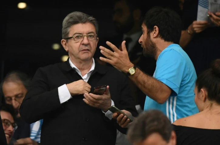 Le chef de file de La France insoumise Jean-Luc Mélenchon (G) à Marseille, le 26 avril 2018