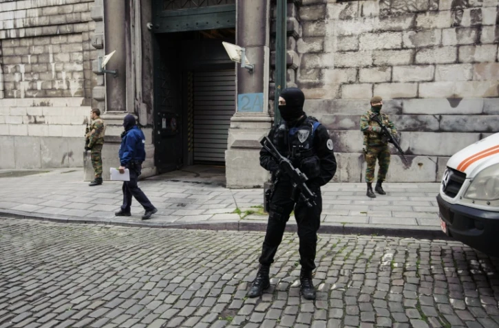 La police belge devant le tribunal de Bruxelles pendant l'audition de Mohammed Amri le 20 novembre 2016