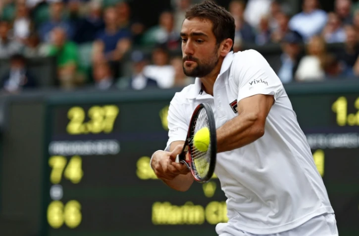 Le Croate Marin Cilic face à l'Américain Sam Querrey en demi-finales à Wimbledon, le 14 juillet 2017