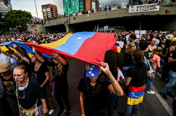 Des Vénézuelien rassemblés le 11 mai 2017 à Caracas après la mort de Miguel Castillo, 38e victime des manifestations