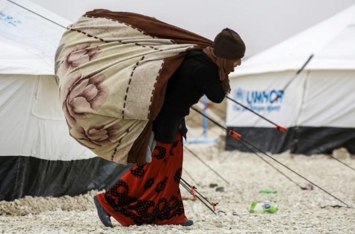 Une Syrienne ayant fui la ville de Deir Ezzor, le 1er février 2017 dans le camp al-Hol en Syrie