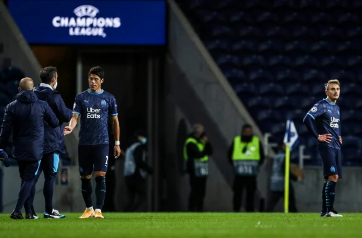 Les Marseillais Japanese abattus après leur déroute sur la pelouse du FC Porto en Ligue des champions, le 3 novembre 2020