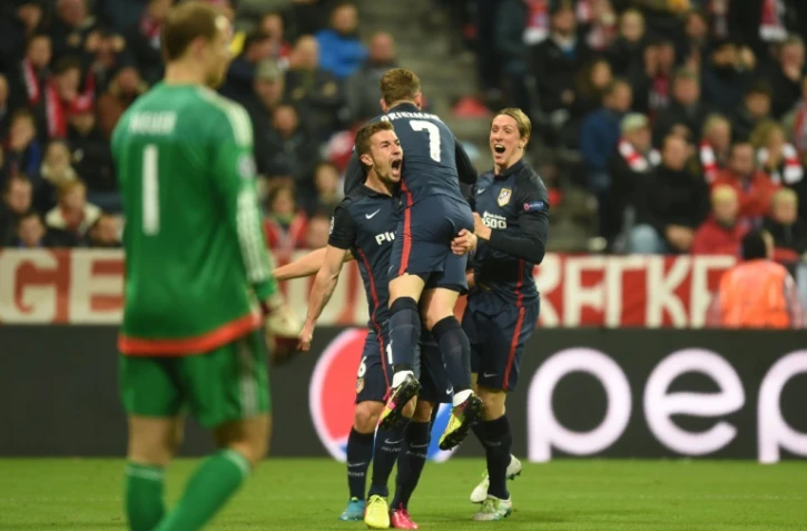 La joie des joueurs de l'Atletico Madrid après le but d'Antoine Griezmann contre le Bayern en demi-finale retour de C1 à Munich, le 3 mai 2016