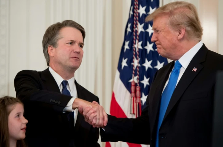 Le juge Brett Kavanaugh et le président Donald Trump, à la Maison Blanche le 9 juillet 2018