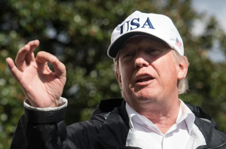 Le président américain Donald Trump, de retour de Floride, fait une déclaration à la presse, le 14 septembre 2017 à la Maison Blanche, à Washington