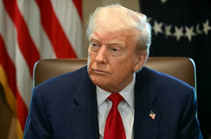Le président américain Donald Trump lors d'une réunion de son gouvernement à la Maison Blanche, le 30 avril 2025 à Washington