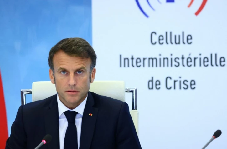 Le président français Emmanuel Macron, lors d'une réunion de la Cellule interministerielle de crise sur les émeutes urbaines, le 30 juin 2023 à Paris