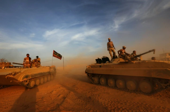 Les forces irakiennes prennent position le 12 novembre 2016 dans le village de Jarif au sud de Mossoul