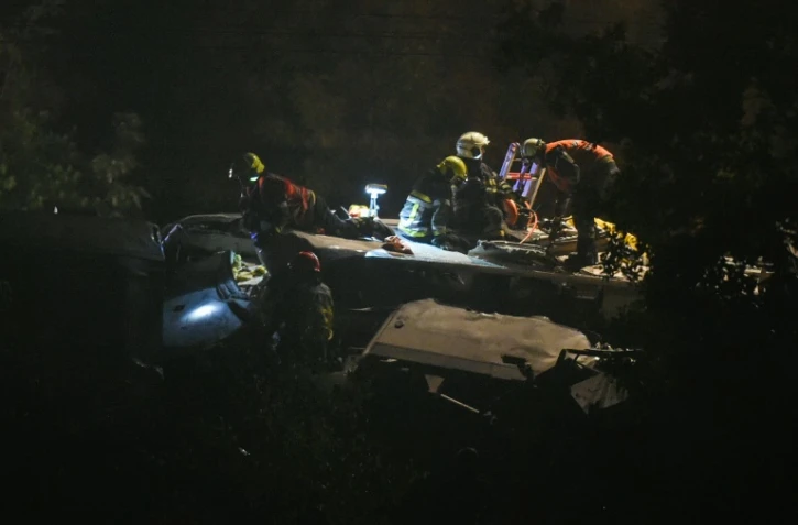 Les secours sur le lieu de la collision survenue le 5 juin 2016 entre un train de voyageurs et un train de marchandises sur la ligne reliant Namur à Liège 