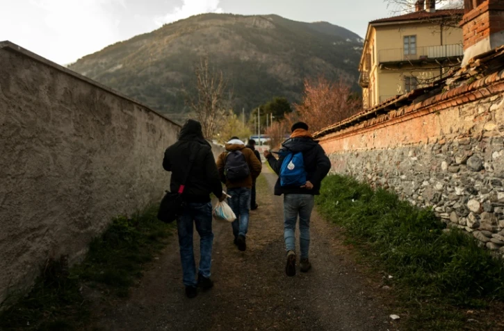 Des migrants Ă Oulx dans les Alpes italiennes, le 22 avril 2021