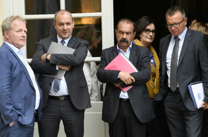 Le président de la CFE-CGC Francois Hommeril, le secrétaire général de la CFTC Laurent Berger, celui de la CGT Philippe Martinez, Angeline Barth secrétaire confédérale de la CGT et le président de la CFTC Cyril Chabanier, à Matignon le 17 juillet 2020 