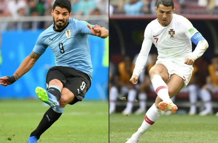 Les attaquants uruguayens Luis Suarez et portugais Cristiano Ronaldo lors du Mondiakl-2018